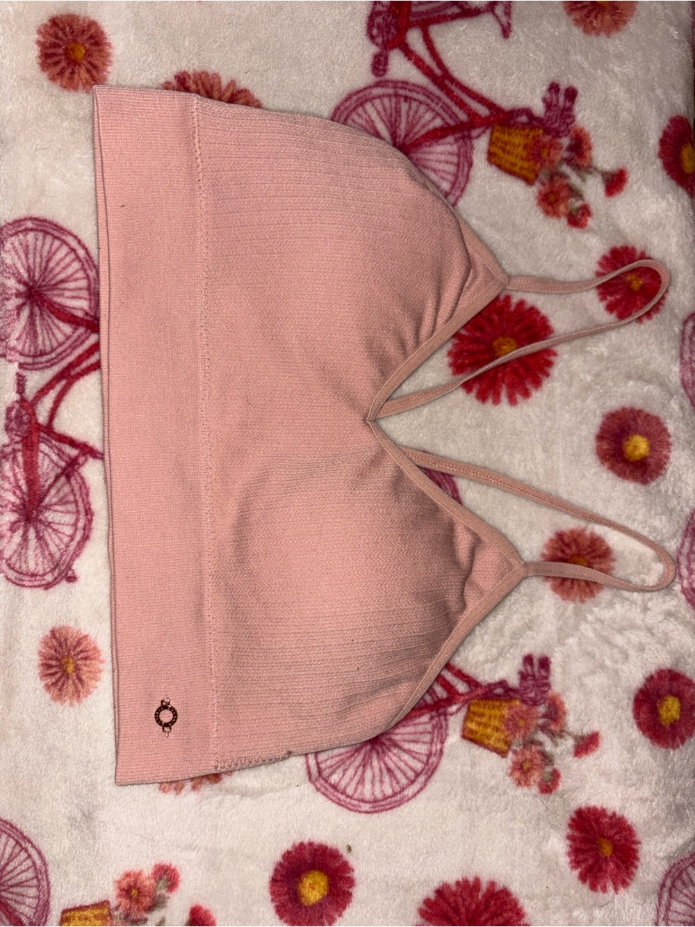 Pink sports bra with adjustable straps